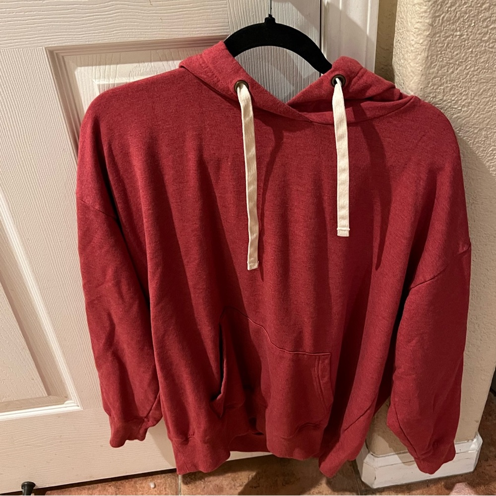 This is a red comfy sweatshirt.